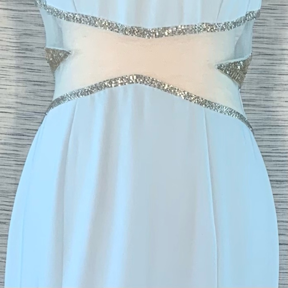 Peak Evenings Sky Blue Sleeveless Formal Evening Gown With Mesh Midriff. - Picture 4 of 15